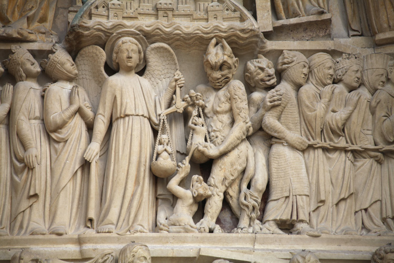 judgement depicted in detail on facade of Cathedral of Notre Dame in Paris