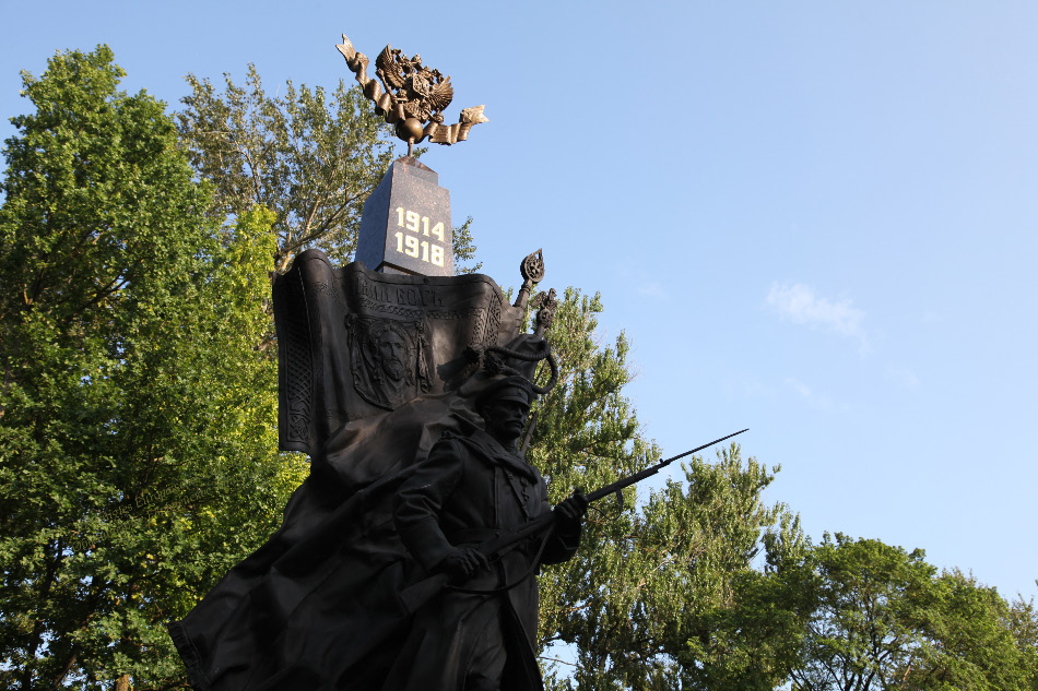 banners and bayonets of fratricidal World War I near train station in Pskov